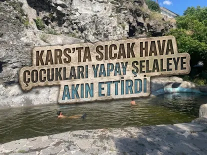 Kars'ta Sıcak Hava Çocukları Yapay Şelaleye Akın Ettirdi