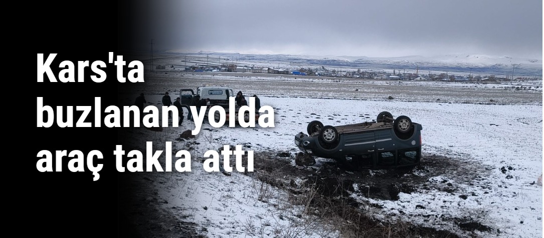 Kars'ta buzlanan yolda araç takla attı